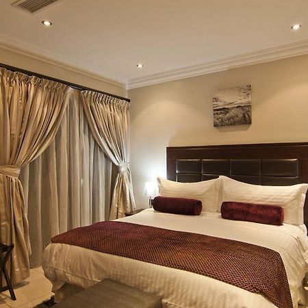 L'Eola Suites Abuja Quarto foto